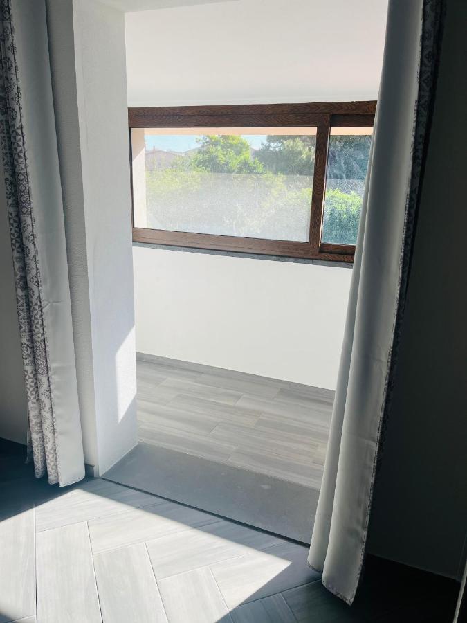 Il Quarzo A) B) Apartment Cabras Ngoại thất bức ảnh